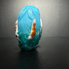 Koi on a teal bead.  Teal to blue fade, Koi Fish, Koi Pond,