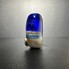 Large Blue Tide Pool Bead Intense blue with glittery dichroic and wisps of white.