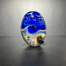 Large Blue Tide Pool Bead Intense blue with glittery dichroic and wisps of white.