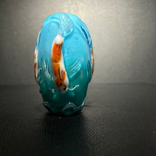 Koi on a teal bead.  Teal to blue fade, Koi Fish, Koi Pond,