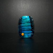 Red and Orange Sea Horse Bead on an Ocean Themed Back Ground.