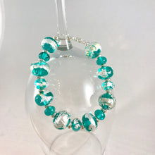 Handcrafted glass light teal and silver glass beaded bracelet.