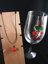 Falling Leaves. Green, Orange and Red leaves dangle from mixed metal earrings.