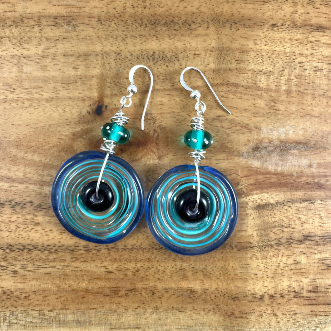 Turquoise, blue and purple dangles.  Earrings with glass disks and beads on Sterling silver.  Lampwork earrings.