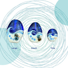 Large Blue Tide Pool Bead Intense blue with glittery dichroic and wisps of white.